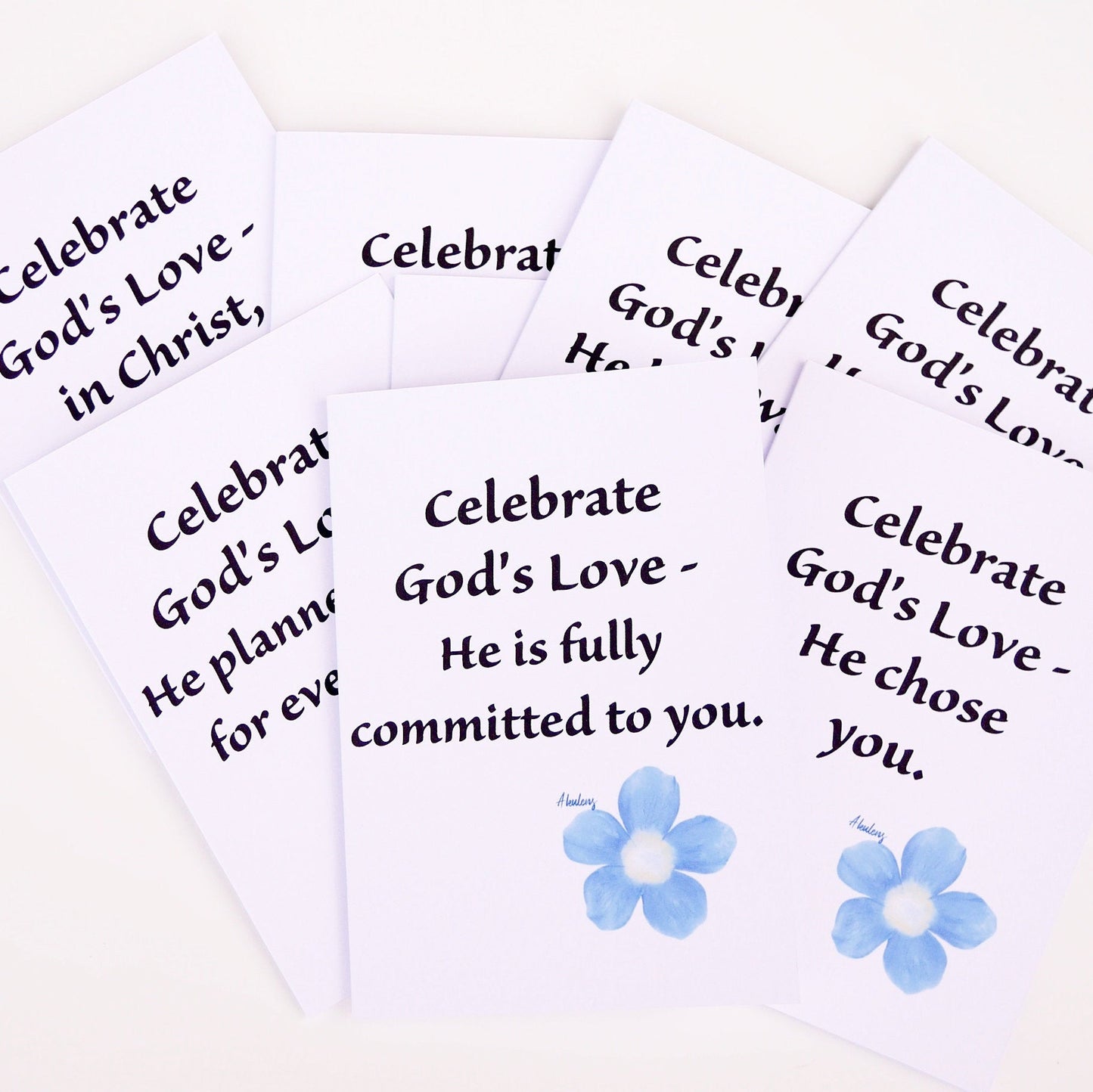 Set of cards with inspirational messages on a white background